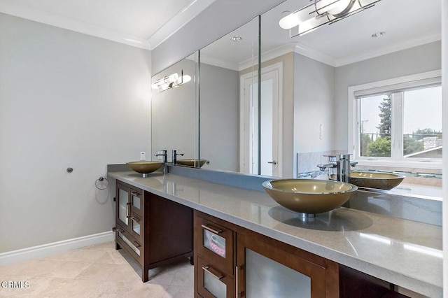 bathroom with vanity, tile patterned flooring, and ornamental molding