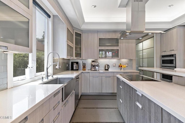 kitchen featuring sink, light tile patterned floors, black electric cooktop, stainless steel double oven, and backsplash