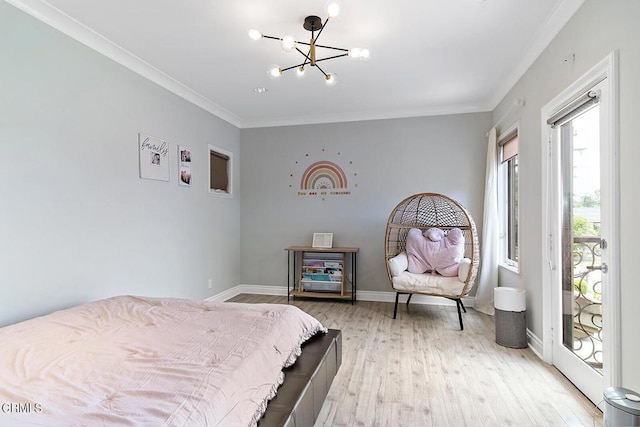 bedroom featuring crown molding, access to exterior, light hardwood / wood-style flooring, and a notable chandelier