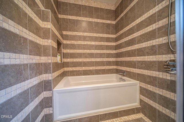 bathroom with tile walls