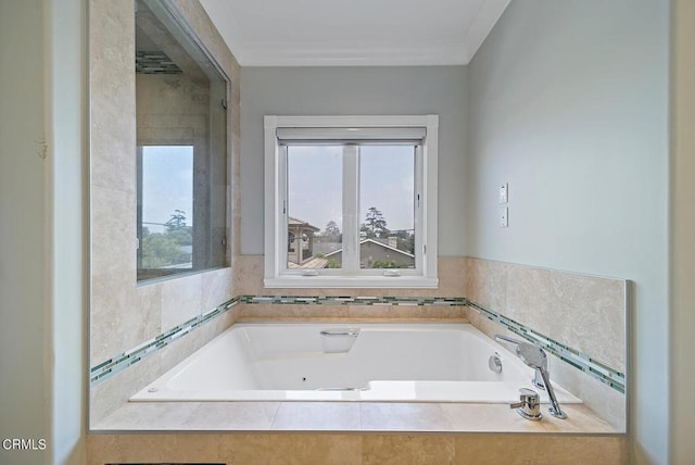 bathroom featuring crown molding, a healthy amount of sunlight, and tiled bath