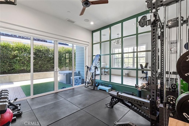 gym featuring ceiling fan