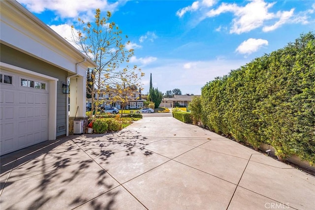 view of patio featuring a garage