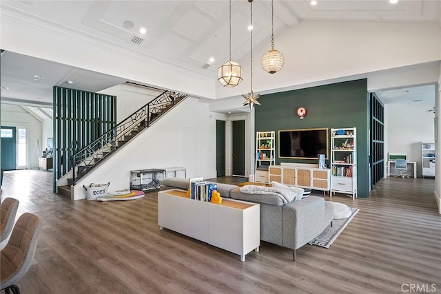 living room featuring beam ceiling, wood-type flooring, ornamental molding, and high vaulted ceiling