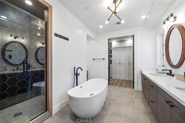 bathroom featuring ornamental molding, vanity, plus walk in shower, and tile patterned floors