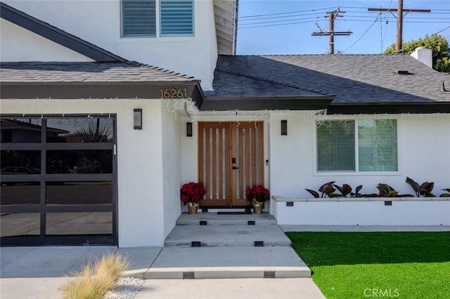 entrance to property featuring a garage