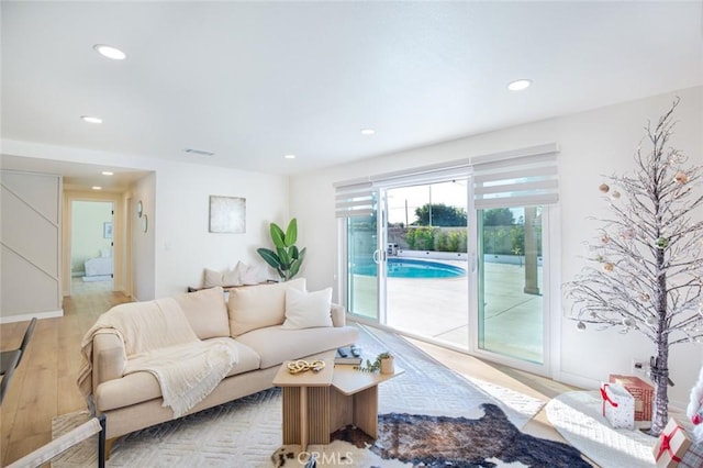 living room with light hardwood / wood-style floors