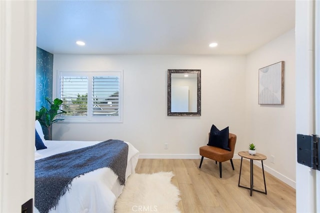 bedroom featuring light wood-type flooring