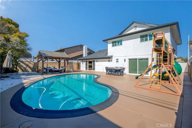 16261 Angler Ln, Huntington Beach, CA 92647 - view of swimming pool featuring a fenced in pool, a gazebo, a patio area, and a fenced backyard