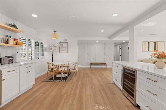 16261 Angler Ln, Huntington Beach, CA 92647 - bar with beverage cooler, recessed lighting, light wood-style flooring, baseboards, and visible vents