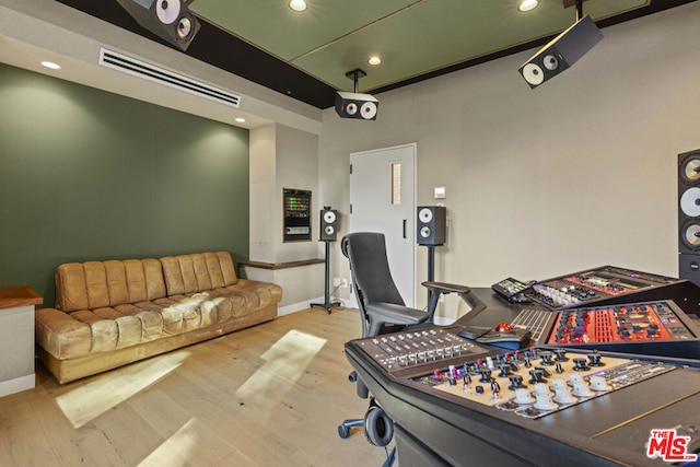 recreation room featuring light hardwood / wood-style floors