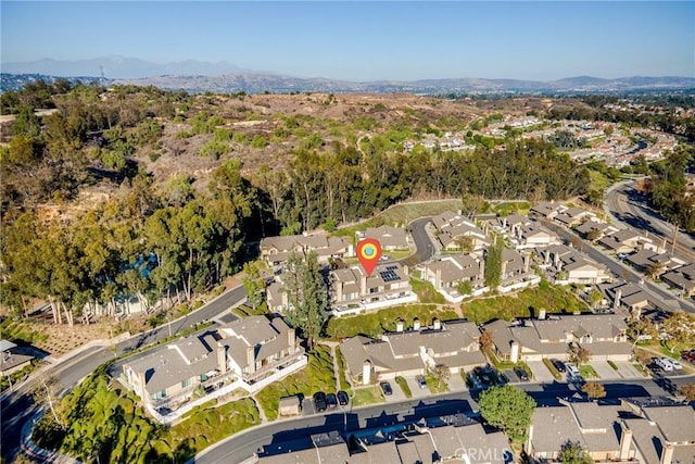 drone / aerial view featuring a mountain view