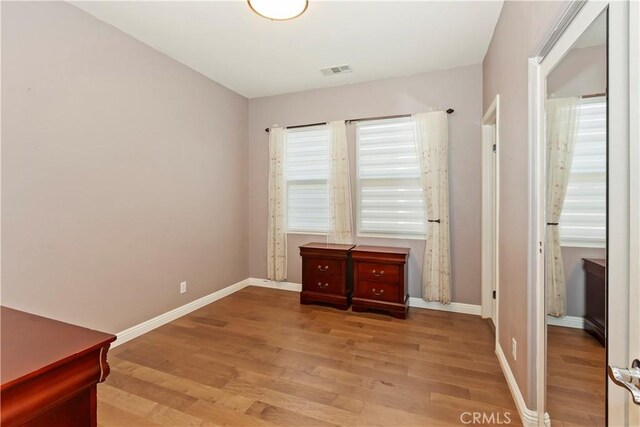 bedroom featuring light wood-type flooring