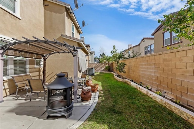 view of yard with a pergola, a patio area, and central AC