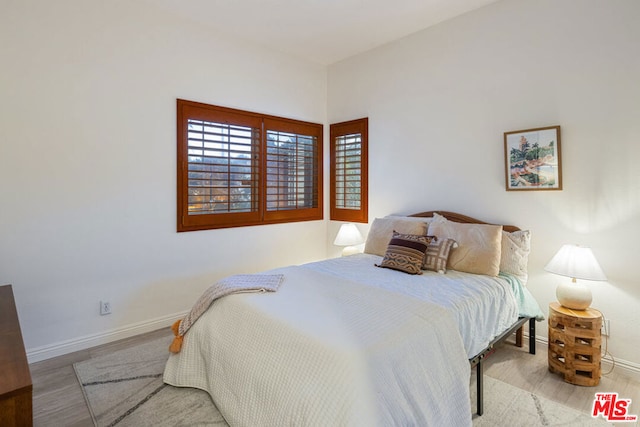 bedroom featuring light hardwood / wood-style floors