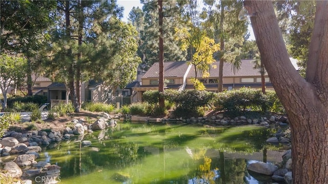 view of property's community featuring a water view