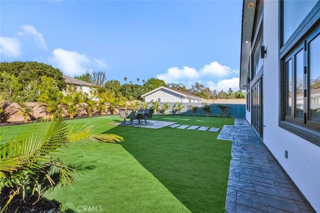 view of yard with a patio area