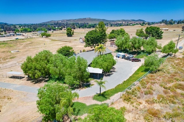 bird's eye view featuring a mountain view and a rural view