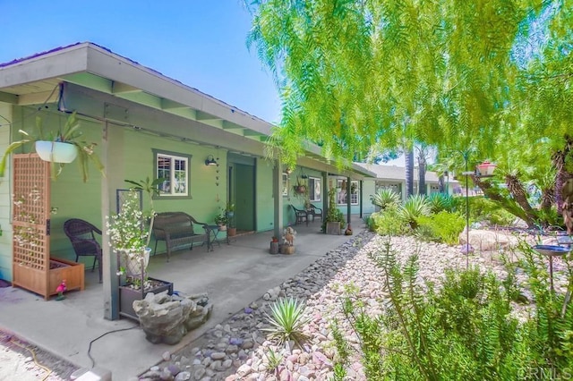 back of house featuring a patio