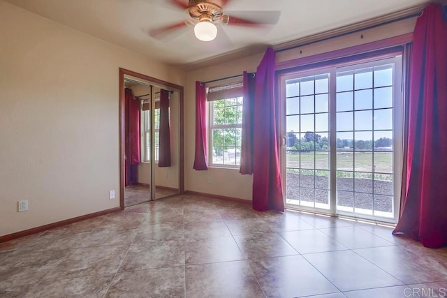 empty room featuring ceiling fan