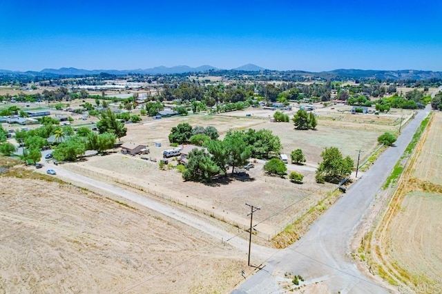 drone / aerial view featuring a mountain view