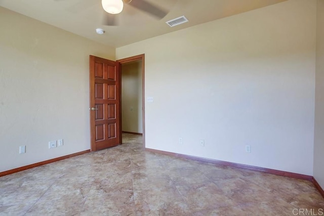 unfurnished room with ceiling fan