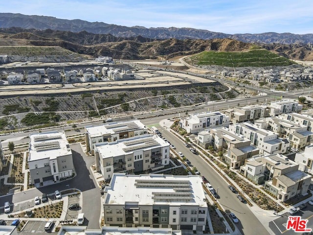 drone / aerial view featuring a mountain view