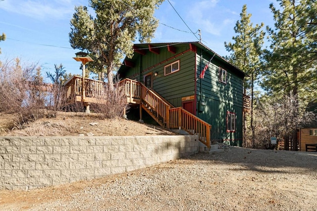 exterior space featuring a wooden deck