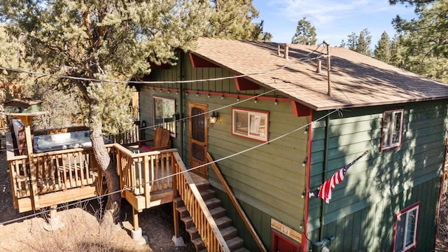 exterior space featuring a wooden deck