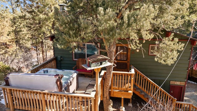 deck with a hot tub