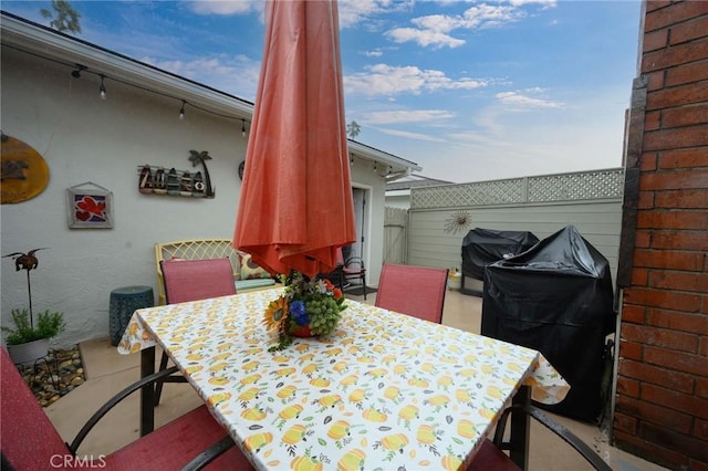 view of patio with a grill