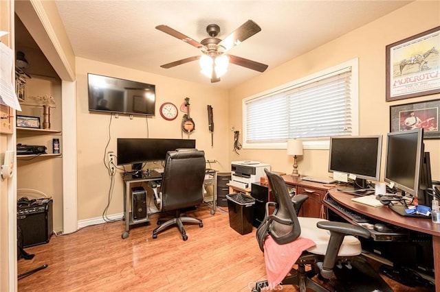 office space with light hardwood / wood-style flooring and ceiling fan