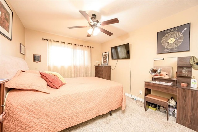 bedroom with ceiling fan and carpet floors