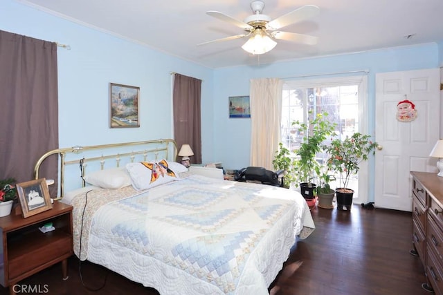 bedroom with dark wood-type flooring and ceiling fan