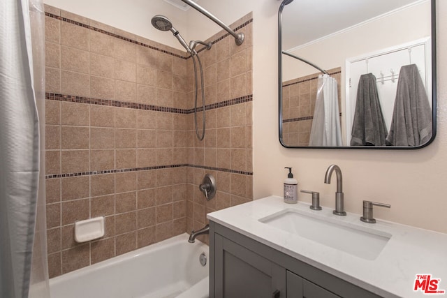 bathroom with vanity and shower / bathtub combination with curtain