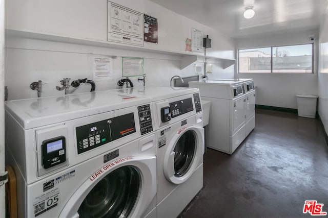 laundry area featuring independent washer and dryer