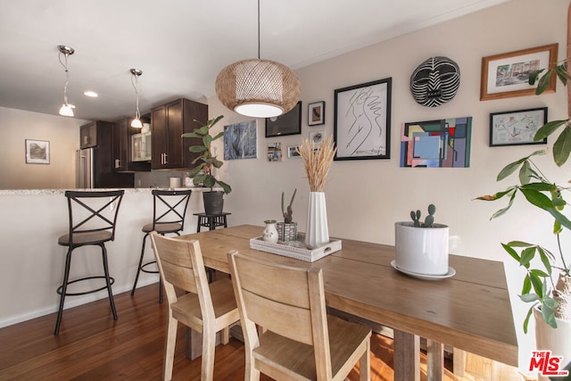 dining room featuring dark hardwood / wood-style floors