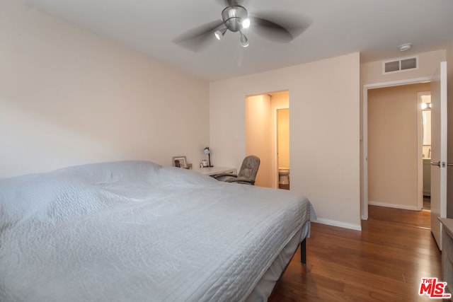 bedroom with dark wood-type flooring and ceiling fan