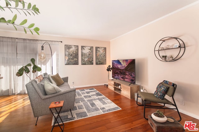 living room featuring ornamental molding and hardwood / wood-style floors