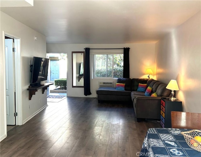 living room with dark hardwood / wood-style floors