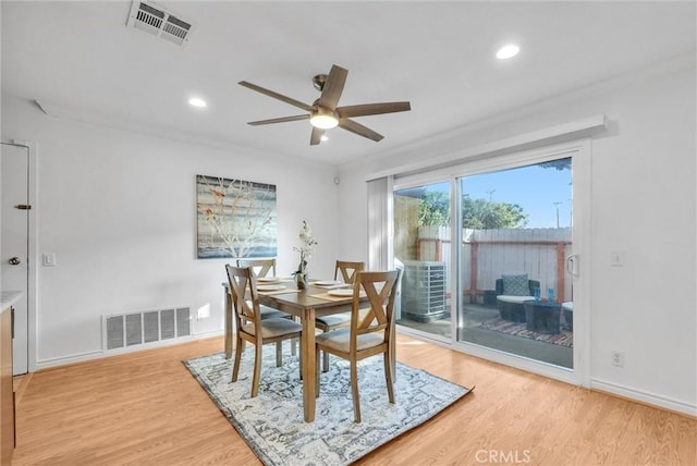 dining room featuring ceiling fan and light wood-type flooring