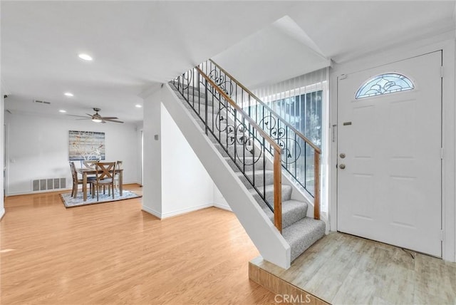 entrance foyer with hardwood / wood-style floors