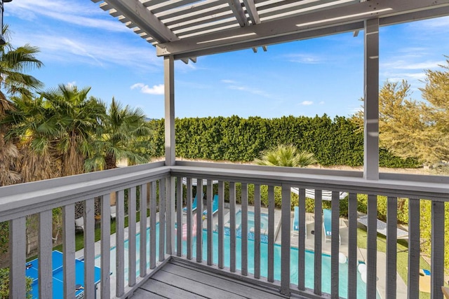 wooden deck featuring a pergola