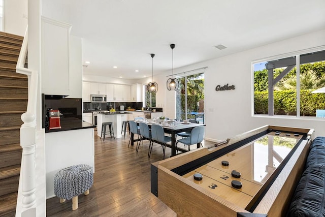 playroom featuring dark hardwood / wood-style floors