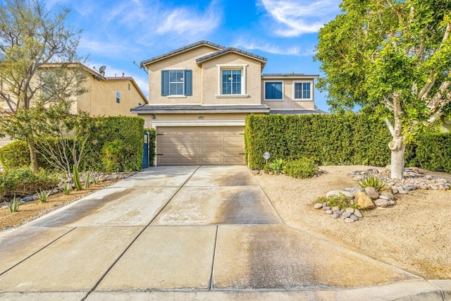 front of property featuring a garage