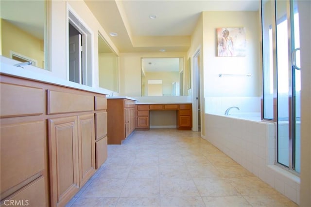 bathroom with vanity, tile patterned floors, and independent shower and bath