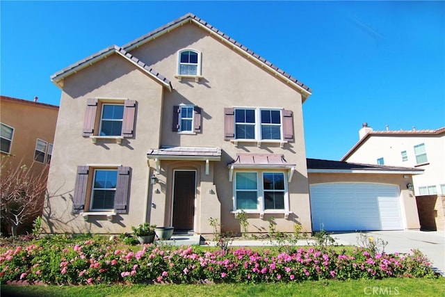 view of front of house with a garage