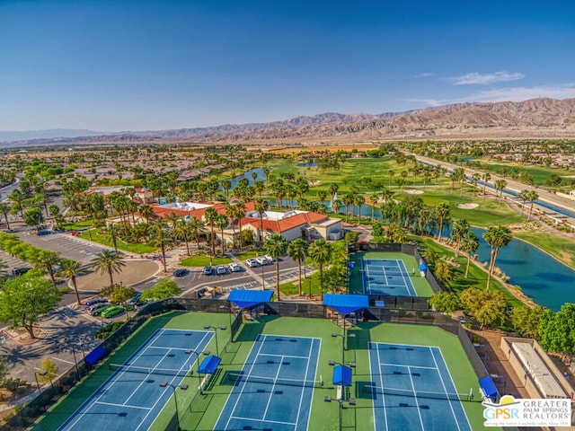 aerial view featuring a water and mountain view