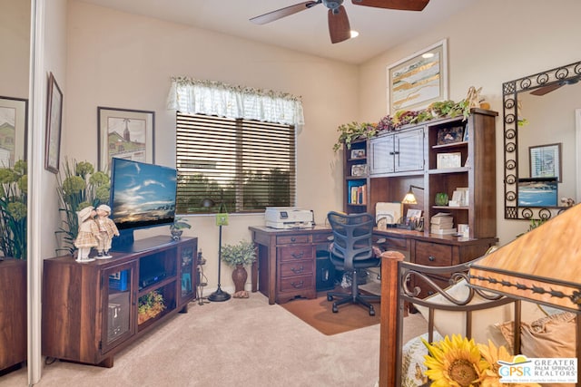 carpeted office with ceiling fan