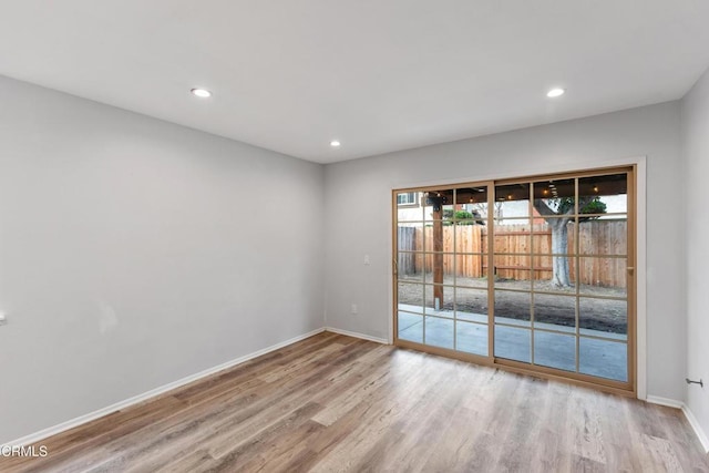 empty room featuring light hardwood / wood-style floors